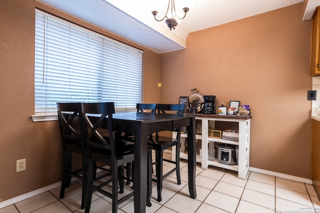 dining area with light tile patterned floors