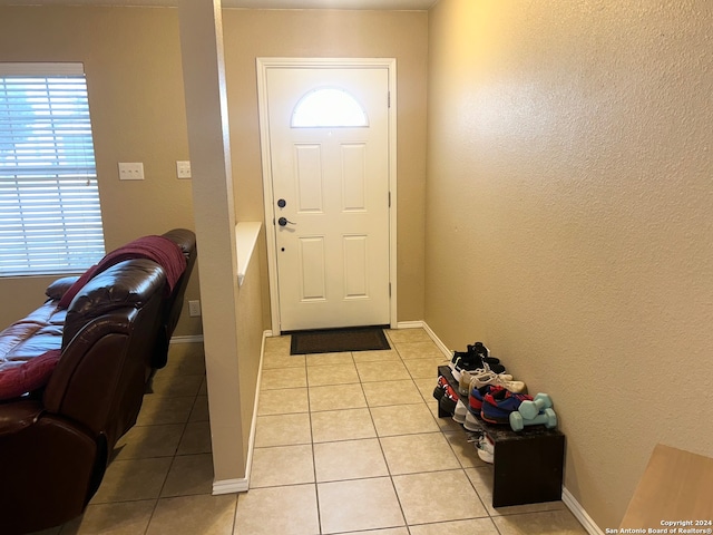 view of tiled foyer entrance