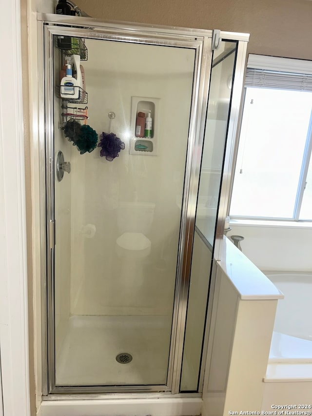 bathroom with plus walk in shower