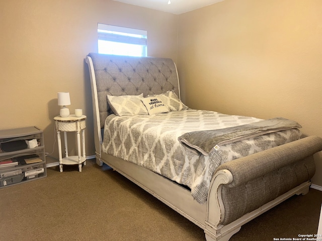 bedroom featuring carpet