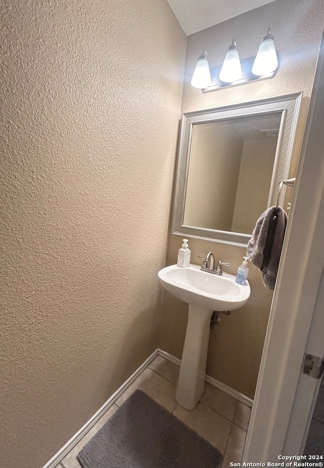 bathroom featuring tile patterned flooring