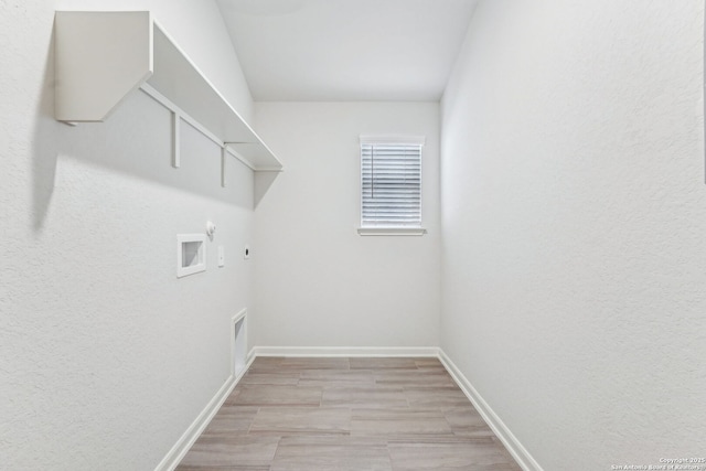 washroom featuring gas dryer hookup and washer hookup