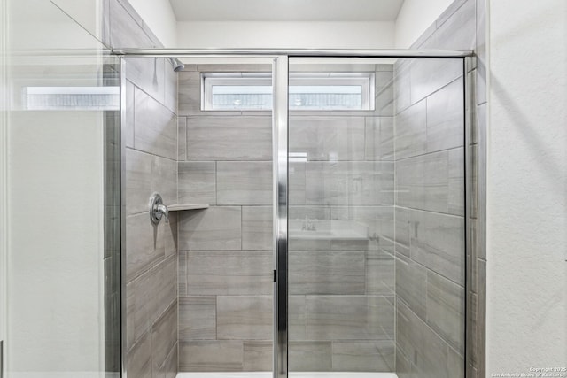 bathroom featuring walk in shower