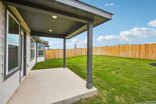 view of yard with a patio area