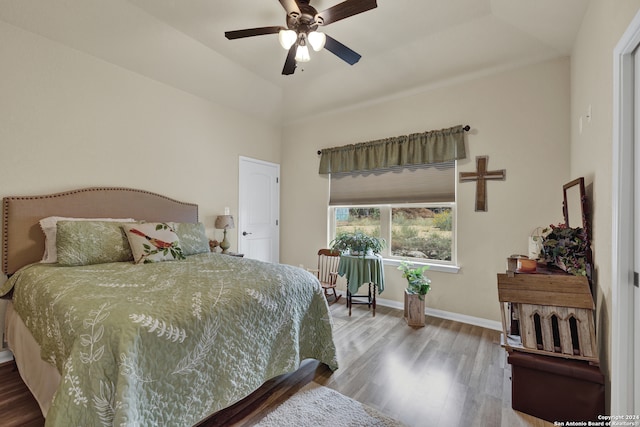 bedroom featuring wood-type flooring and ceiling fan