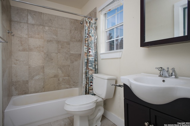 full bathroom with toilet, tile patterned floors, shower / bath combo, and vanity