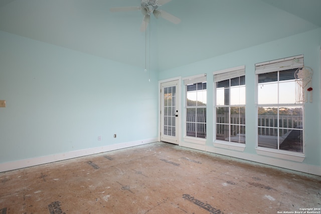 spare room with ceiling fan and french doors