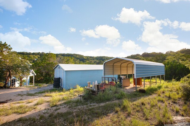 282 Hill Top, Lakehills, TX 78063 - view of mountain background featuring a forest