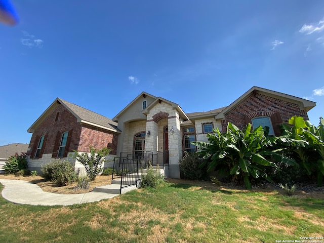 view of front of home with a front yard