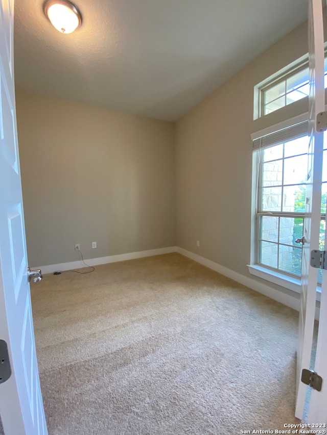 view of carpeted spare room