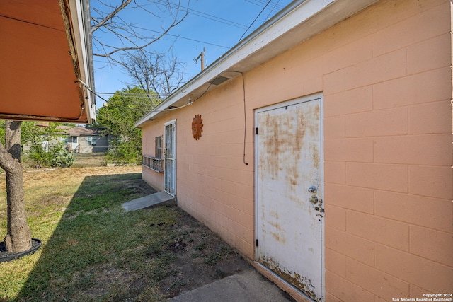 view of property exterior featuring a yard