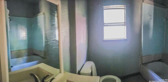 full bathroom featuring toilet, vanity, and shower / bathtub combination