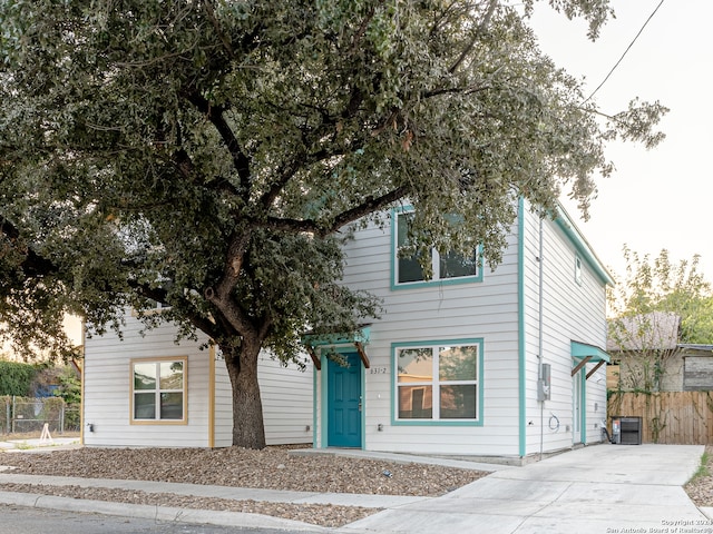 view of front of house with cooling unit