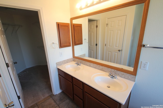 bathroom featuring vanity and tile patterned flooring