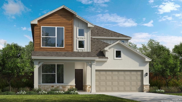 view of front of house with a garage and a front yard