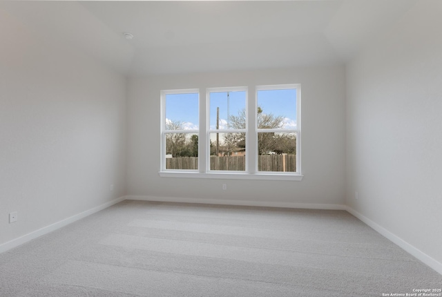 empty room with carpet flooring