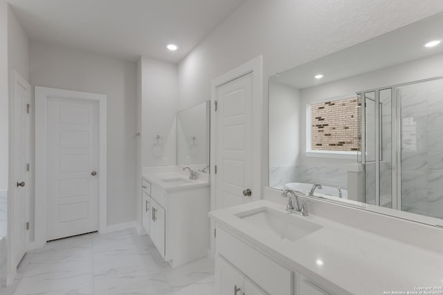 bathroom with plus walk in shower and vanity