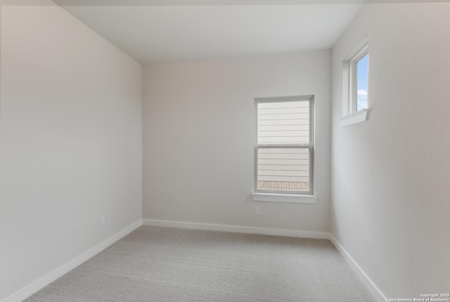 empty room featuring carpet floors