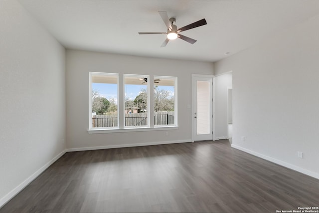 unfurnished room featuring dark hardwood / wood-style flooring