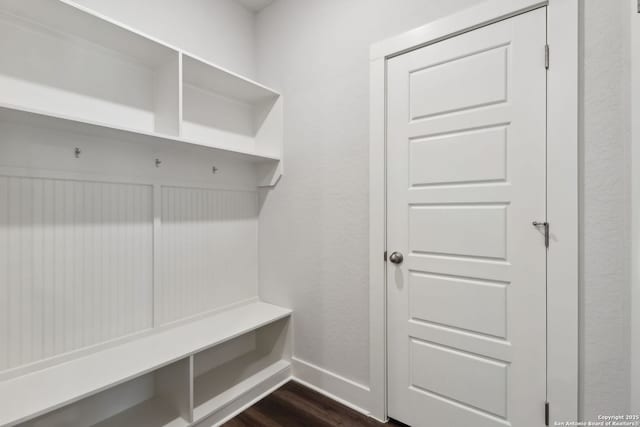 mudroom with dark wood-type flooring