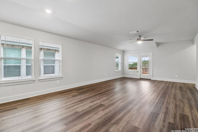 unfurnished room featuring dark hardwood / wood-style flooring and ceiling fan