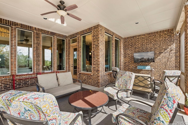 view of patio / terrace featuring an outdoor living space and ceiling fan