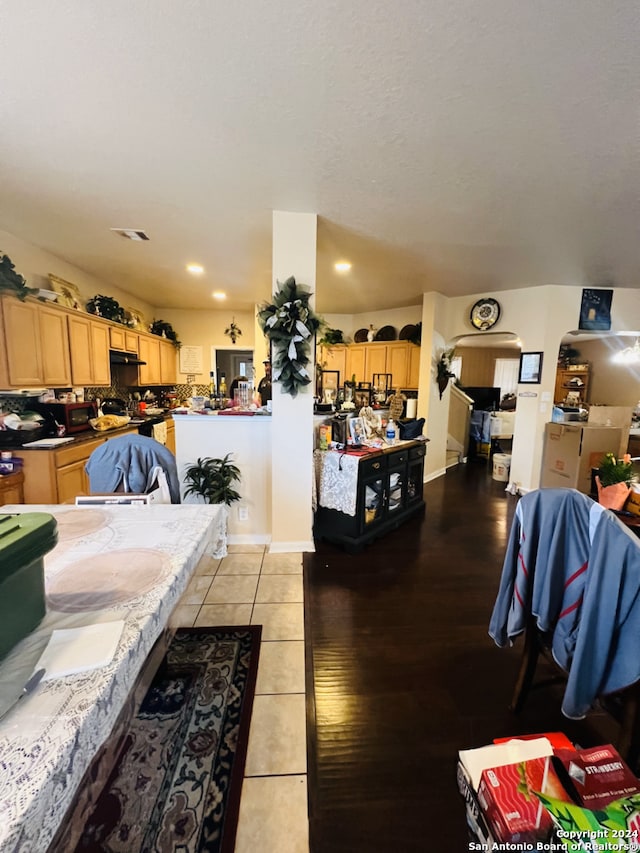 interior space with light tile patterned floors