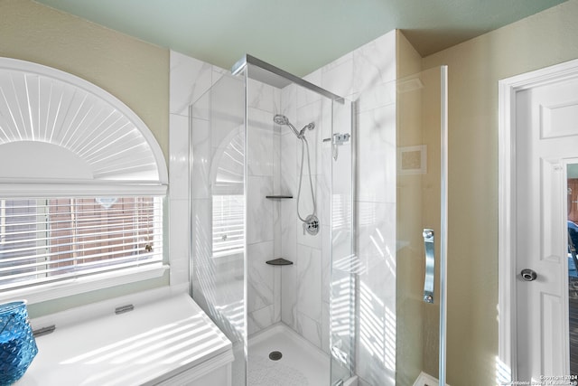 bathroom featuring walk in shower