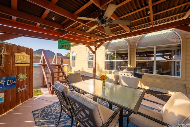 view of patio with ceiling fan