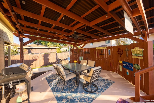 view of patio with a grill and ceiling fan