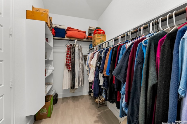 walk in closet featuring light hardwood / wood-style floors