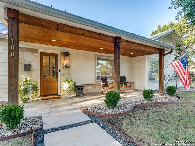 property entrance with a porch