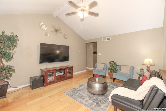 living room with vaulted ceiling with beams, light wood-type flooring, and ceiling fan