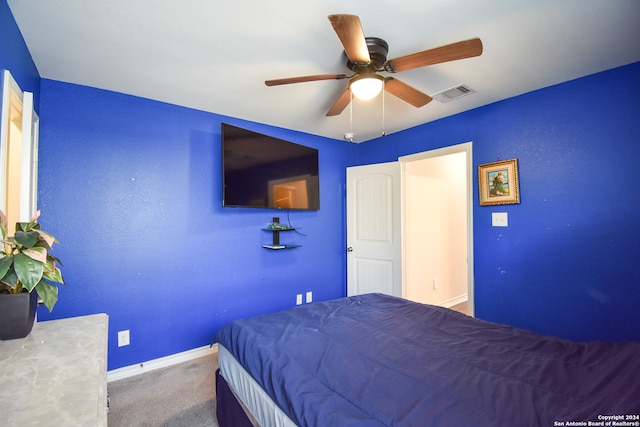 bedroom with ceiling fan and carpet flooring