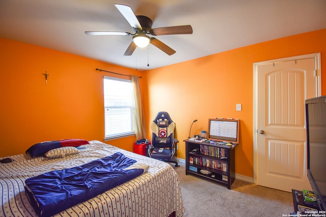 bedroom featuring ceiling fan and carpet floors