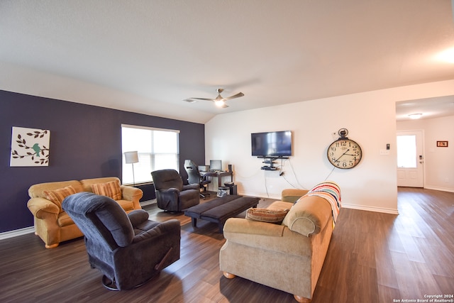 living room with lofted ceiling, dark wood-type flooring, and ceiling fan