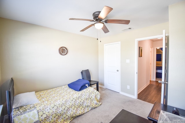 carpeted bedroom featuring ceiling fan