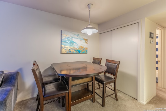 view of carpeted dining room