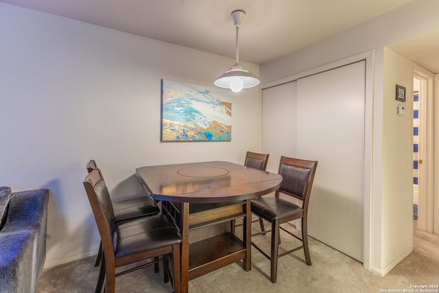 8702 Village Dr Unit 507, San Antonio, TX 78217 - dining area featuring light colored carpet