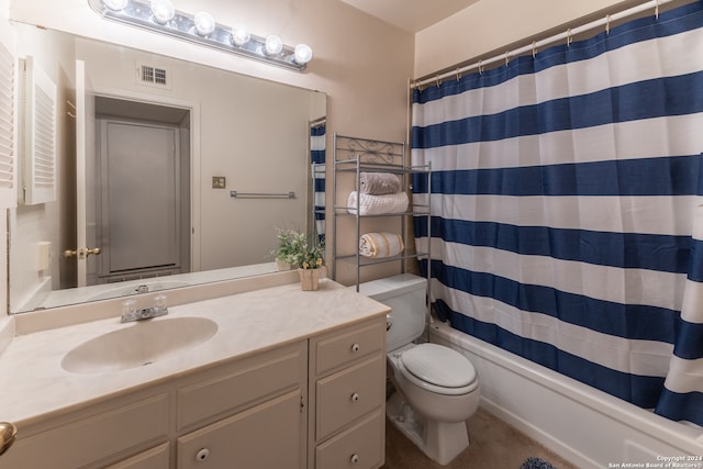 full bathroom with vanity, shower / bath combination with curtain, and toilet