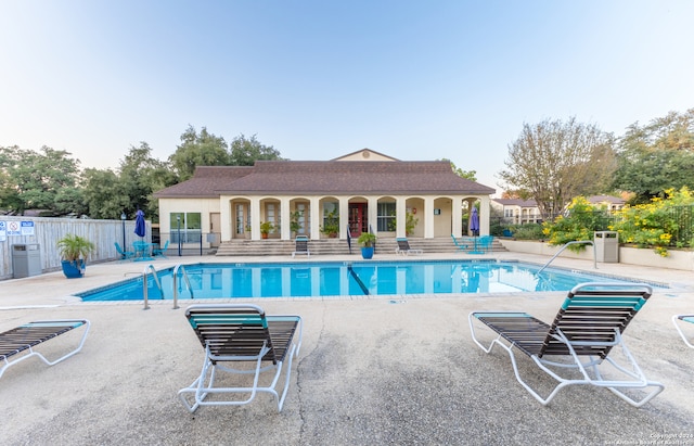 8702 Village Dr Unit 507, San Antonio, TX 78217 - community pool featuring a patio and fence