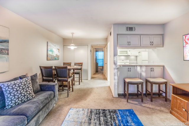 living room with light carpet