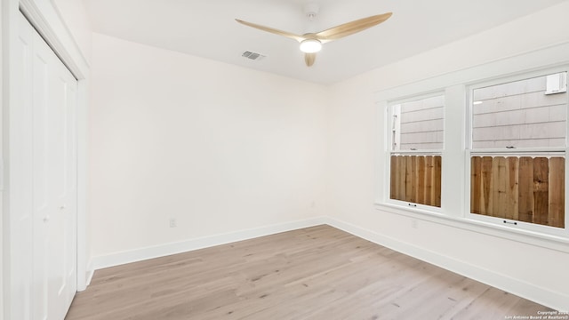 unfurnished room with light hardwood / wood-style flooring and ceiling fan