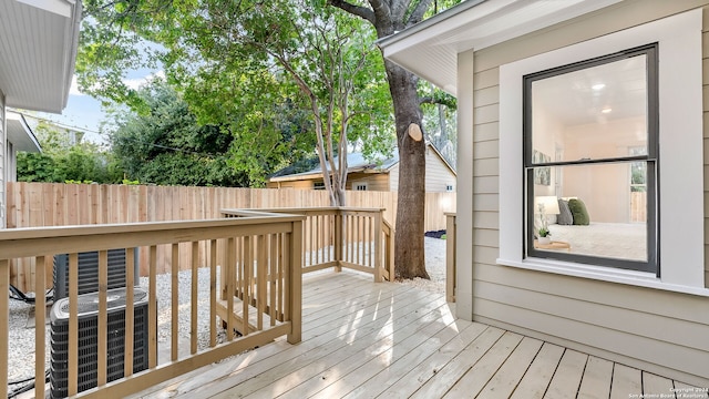 wooden terrace with cooling unit