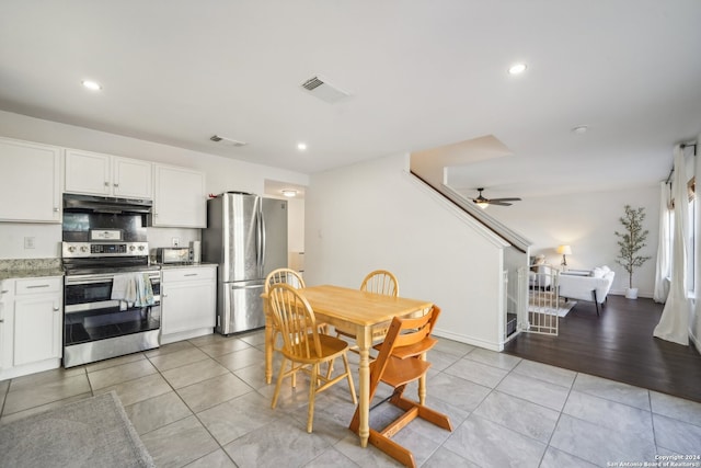 dining area featuring ceiling fan and light hardwood / wood-style flooring