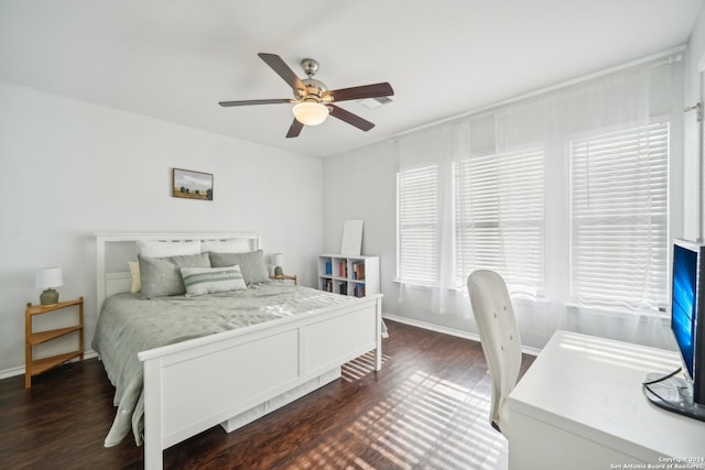 bedroom featuring dark hardwood / wood-style floors and ceiling fan