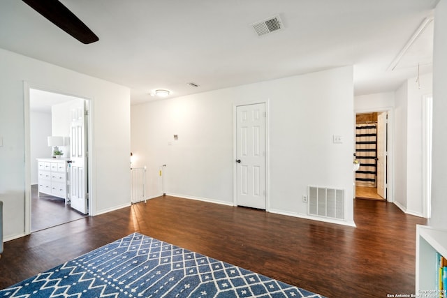 interior space with dark hardwood / wood-style flooring