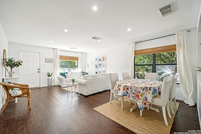 dining room with dark hardwood / wood-style floors