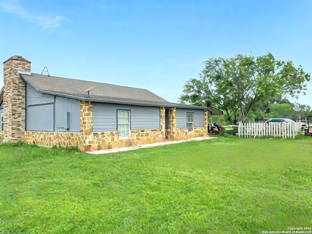 exterior space with a lawn