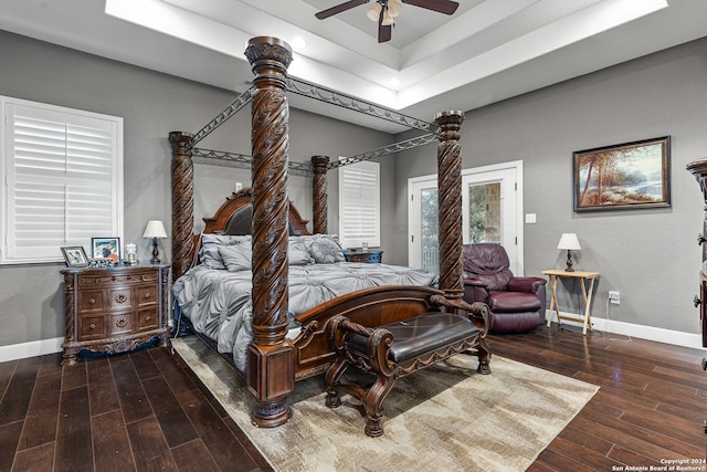 bedroom featuring dark hardwood / wood-style floors and ceiling fan